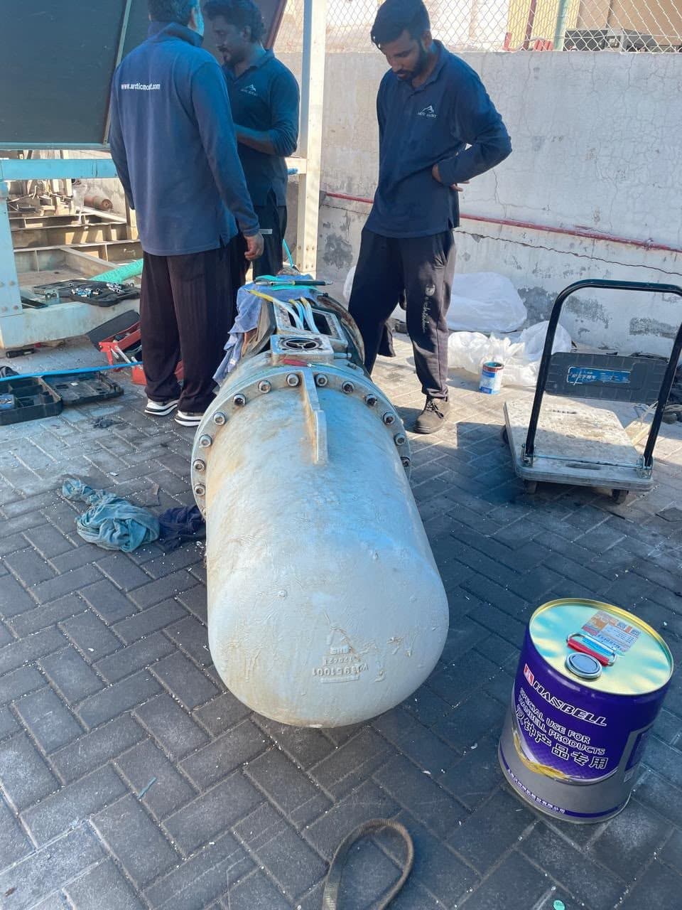 Screw compressor opened for overhaul by Arctic Mount technicians in the workshop yard